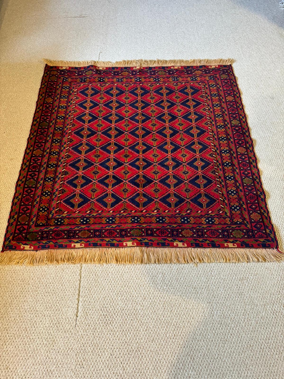 Hand-Knotted Rug