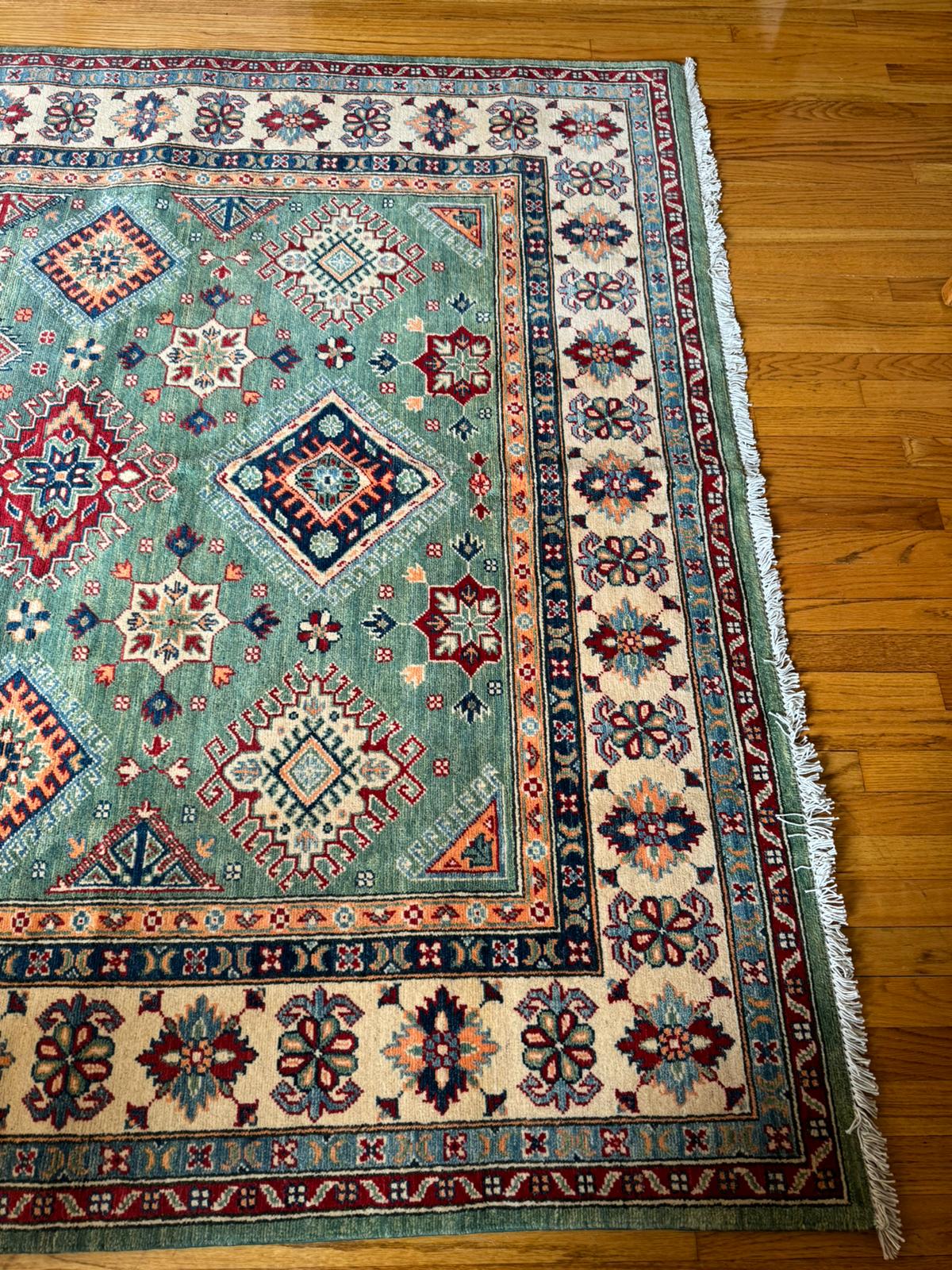 Elegant Qazaq: Handknotted Afghan Artistry Rug (6.8x10 Feet)