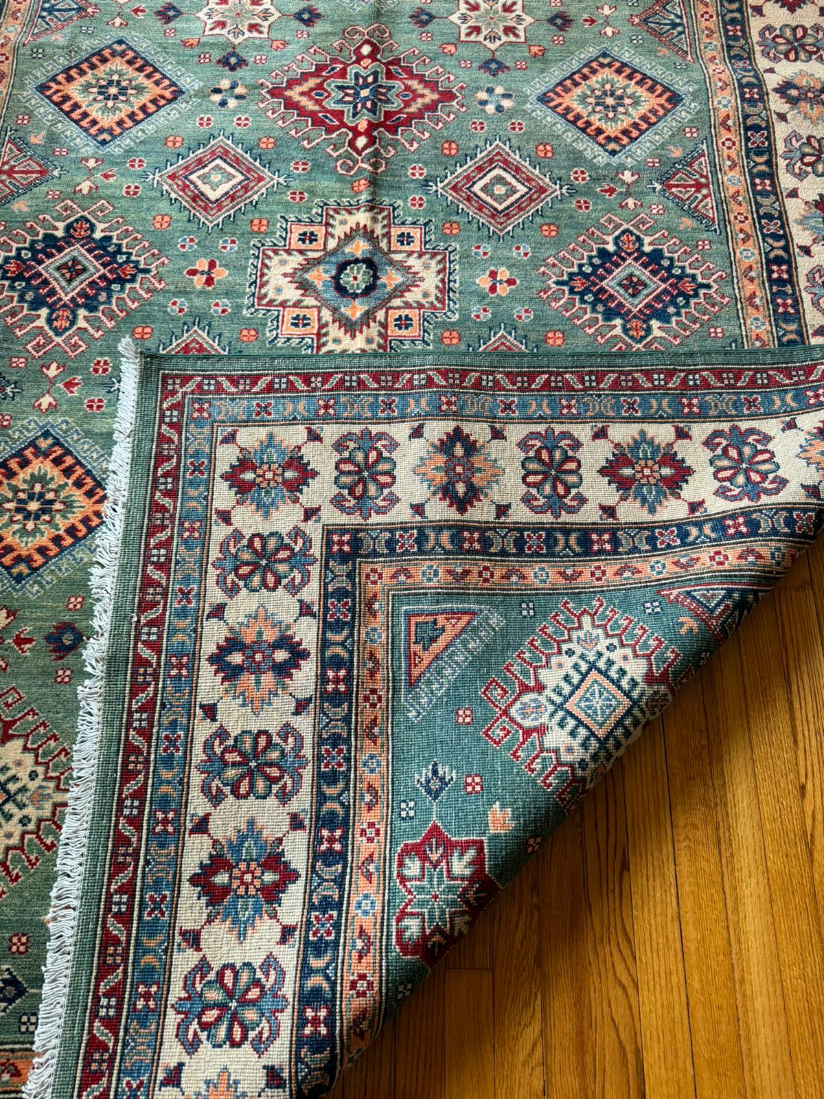 Elegant Qazaq: Handknotted Afghan Artistry Rug (6.8x10 Feet)