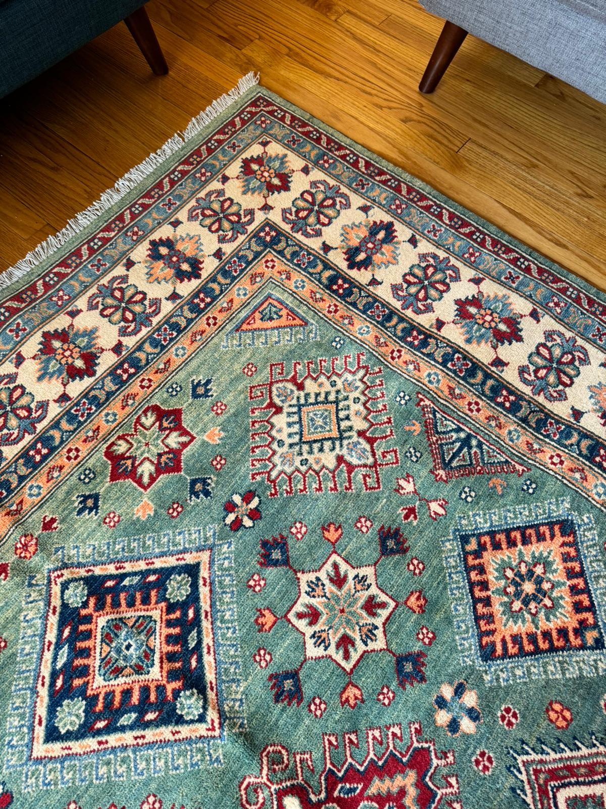 Elegant Qazaq: Handknotted Afghan Artistry Rug (6.8x10 Feet)